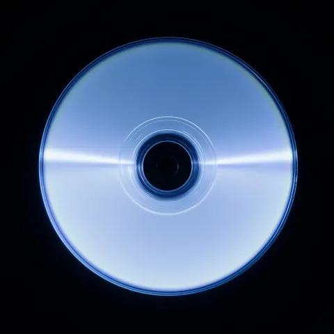 One blank CD, centred, translucent, clean, y2k, 35mm
