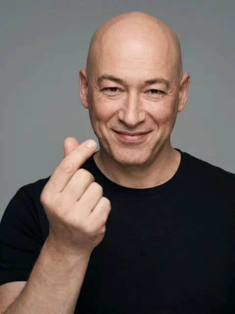 Studio Portrait with Finger Heart Gesture