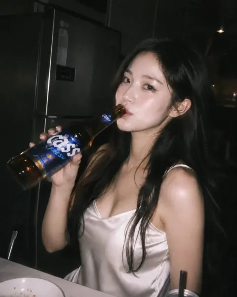 Ultra-Realistic Candid Night Photography of a Beautiful East Asian Woman with Long