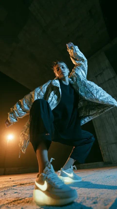 Female Model Puffer Jacket Dancing Overpass Night