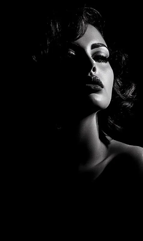 Femme Fatale Against Solid Black Background
