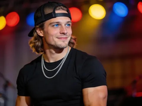 Young Man In Backward Cap