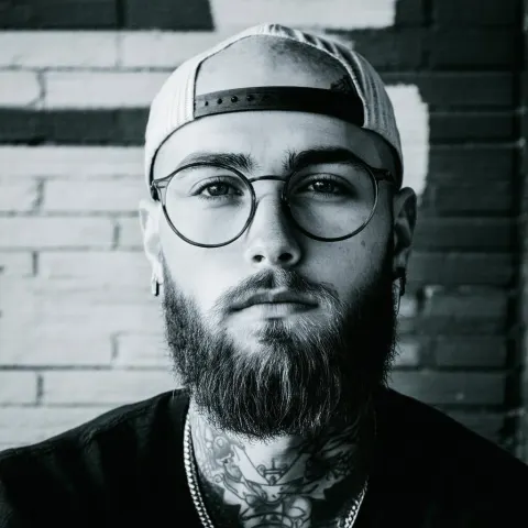 Gritty Fomapan Portrait Of Tattooed Man