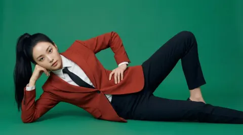 Beautiful Korean woman in red blazer fashion editorial