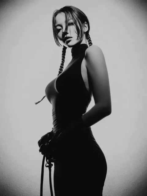 Confident Woman's Half-Body Portrait in a Minimalist Studio