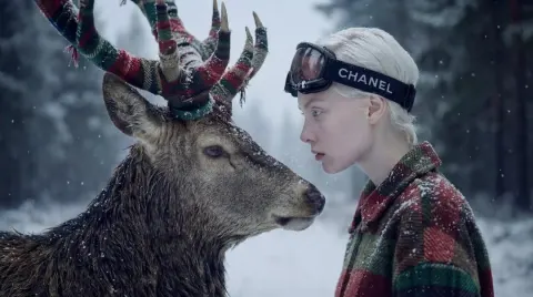 Hyper-realistic 8K Surreal Winter Fantasy Portrait of a Young Ethereal Woman with a Majestic Deer in a Snowy F