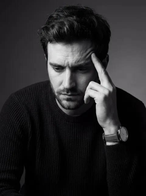Introspective Male Portrait Photography in Black and White Art Style
