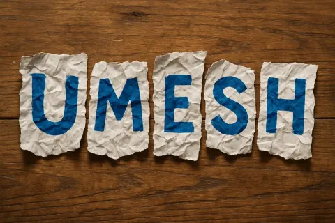 Photorealistic image of torn paper spelling [NAME]