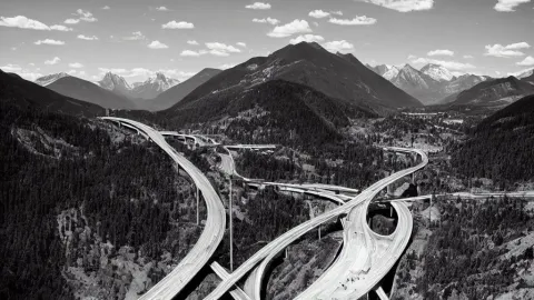 Landscape Photo of Mountains with Highways and Bridges