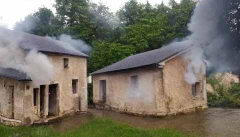 Mini Dv Camera Footage of a Heavy Heavy Burning French Style Little House