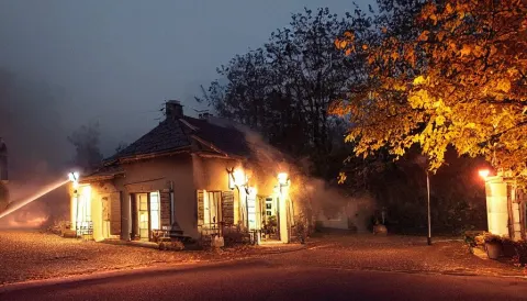 Mini Dv Still of a Heavy Burning French Style Little House