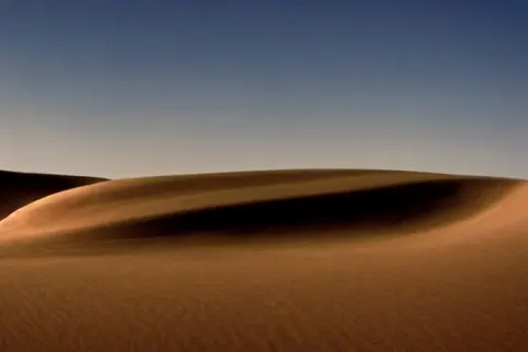 Cinematic Photograph of a Sand Wave in a Serene Vast Desert
