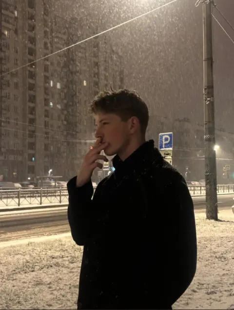 Snowy Night Smoker Portrait