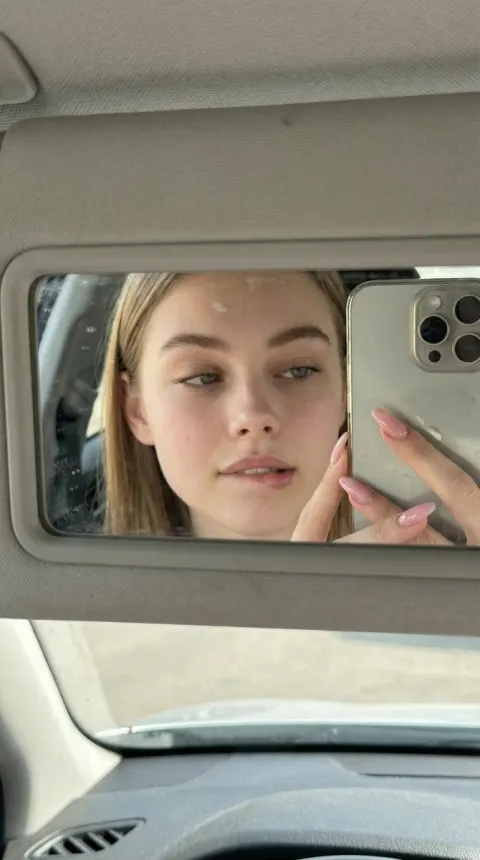 Playful Visor Mirror Selfie