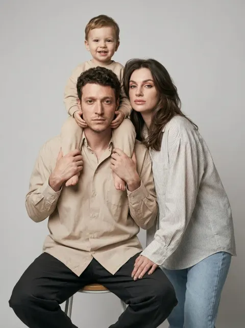 Warm Family Portrait in Minimalist Studio