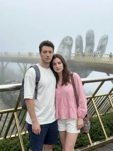 Golden Bridge Couple Travel Portrait