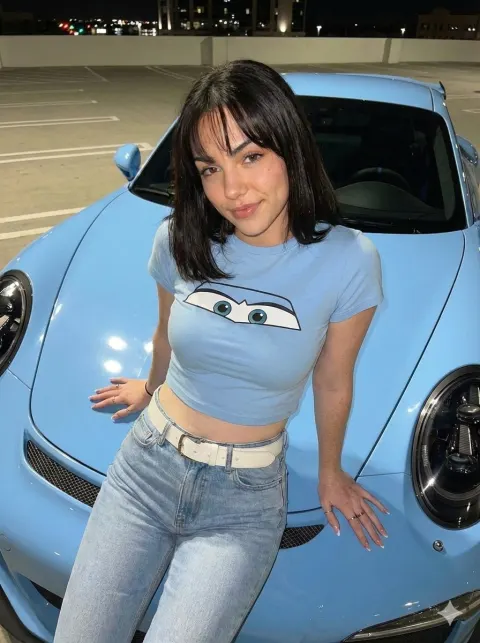 Night Portrait With Blue Sports Car