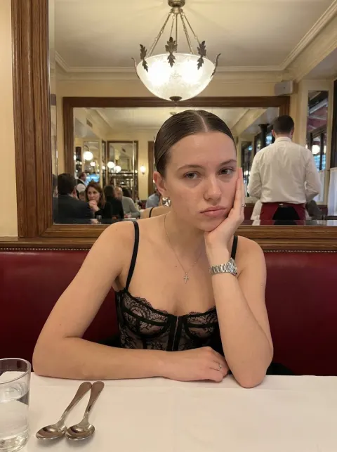 Elegant Woman in Bistro