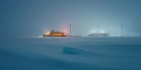 Antarctic Research Station in Blizzard