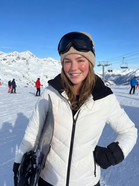Natural Ski Girl On Snowy Slope
