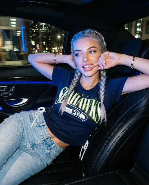 Stunning Woman in Luxury Car