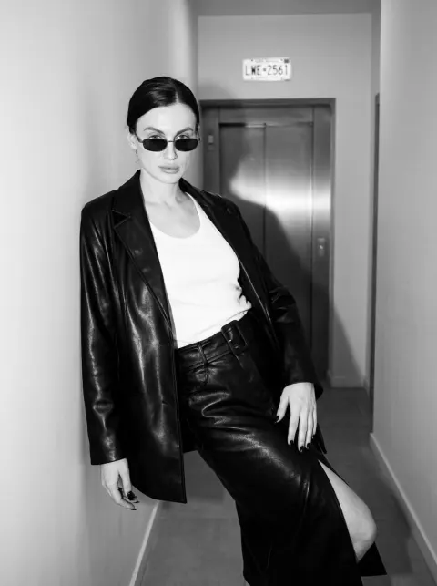 Stylish Leather Outfit In Hallway