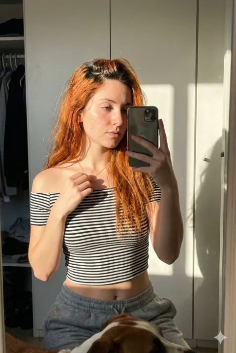 Copper-Haired Mirror Selfie Glow