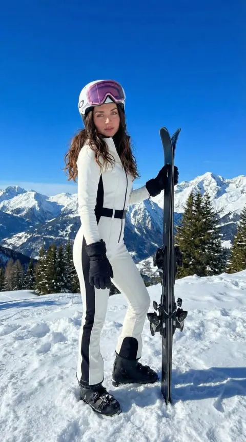 Ski Beauty Under Moonlit Peaks