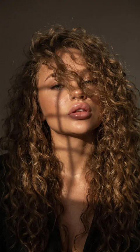 Mysterious Curly Hair Portrait Cinematic Light
