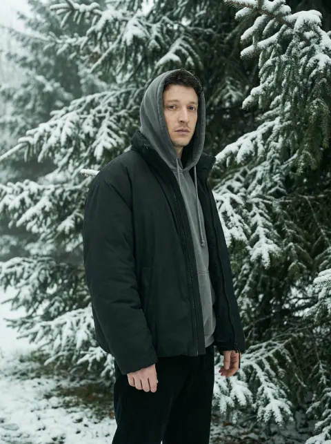 Man in Winter Forest Portrait