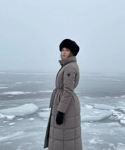 Serene Winter Portrait on Frozen Lake