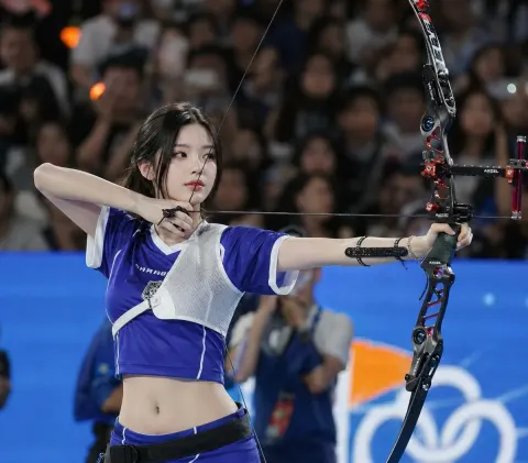 Confident Female Archer Live Competition