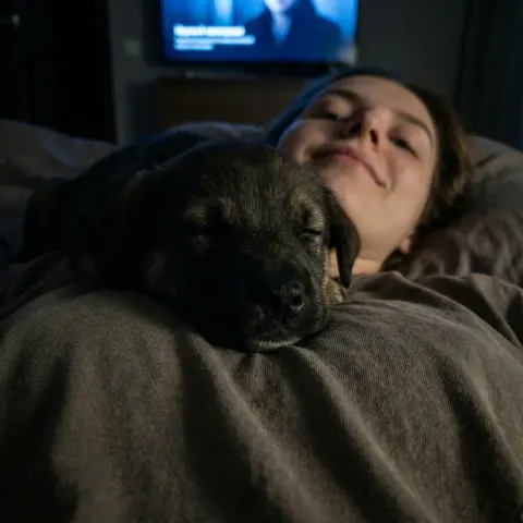 Sleepy Puppy on Chest