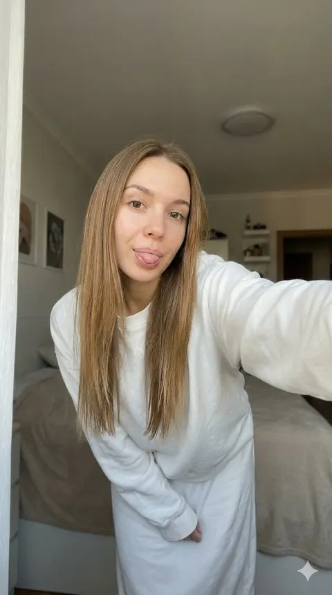 Playful Girl Bedroom Selfie