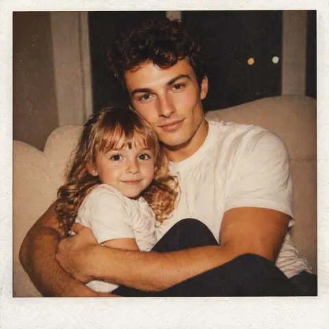 Cozy Father Daughter Polaroid Moment