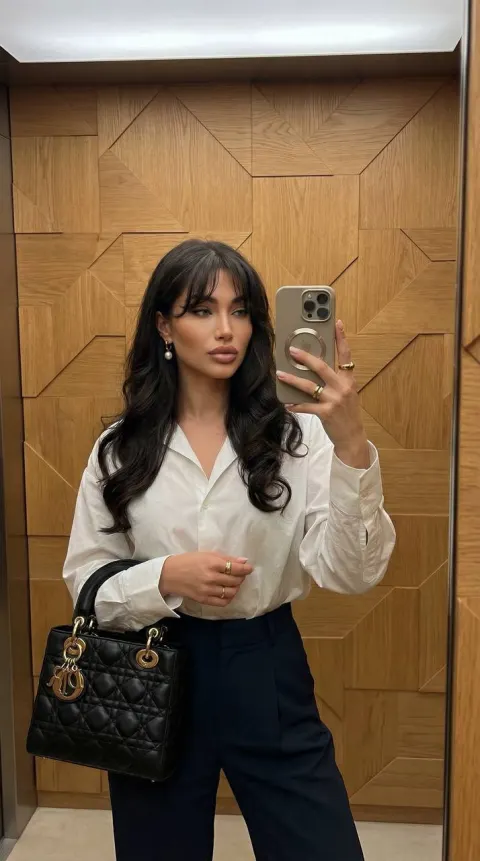 Elegant Mirror Selfie in Luxury Setting