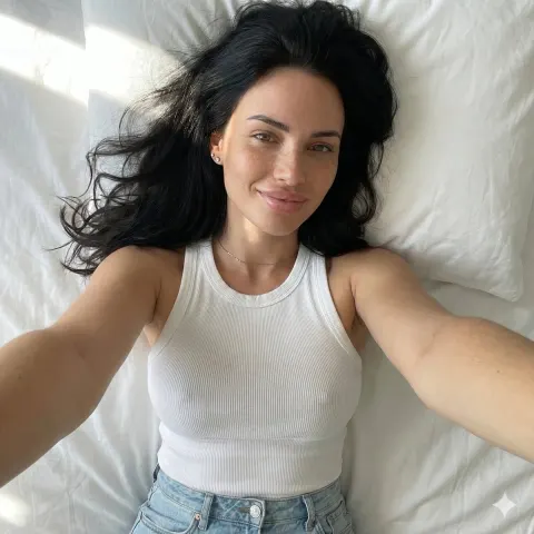 Relaxed Sunlit Selfie On Bed