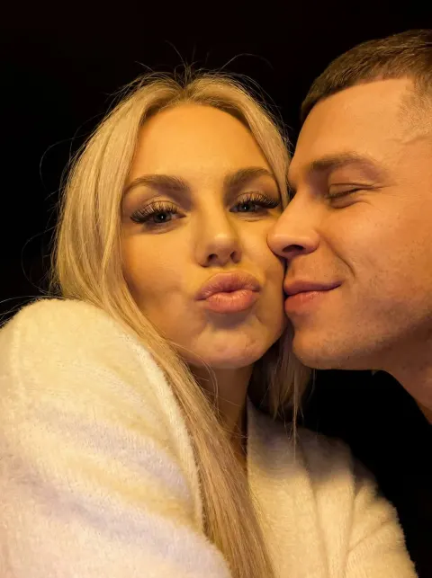 Playful Cheek-to-Cheek Selfie