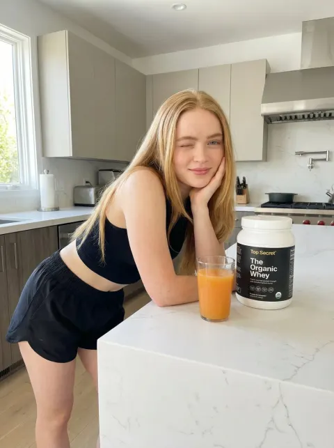 Fit Girl Winking with Protein