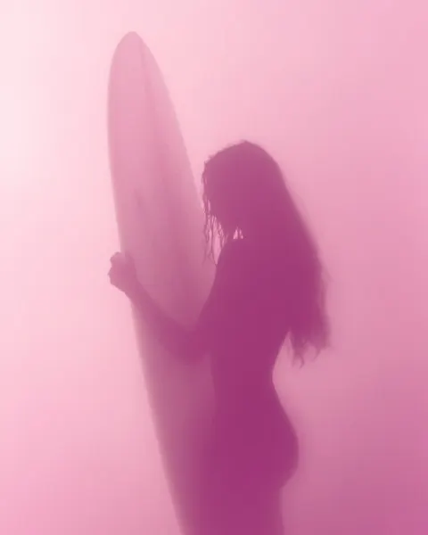 Blurred Pink Silhouette Woman Surfboard