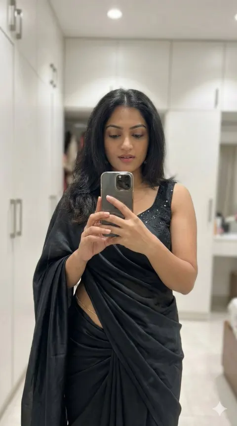 Mirror Selfie in Black Saree