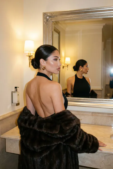 Elegant Woman in Luxury Marble Bathroom