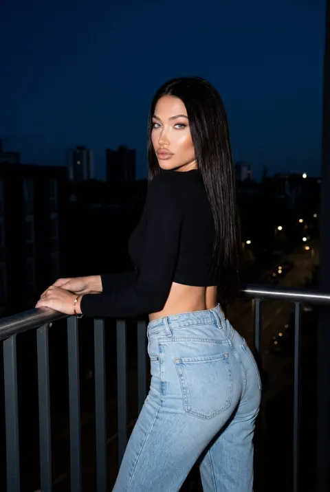 Night Balcony Over-Shoulder Portrait