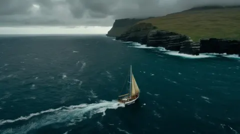 Drone View of Sailboat Battling Choppy Faroe Seas