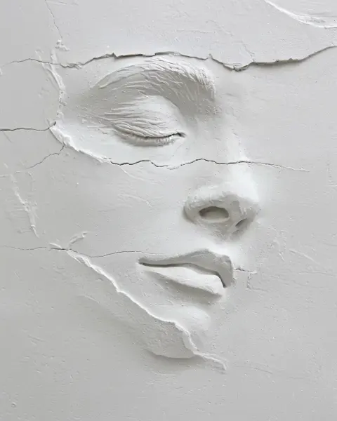 Stone Carved Face Plaster Painted