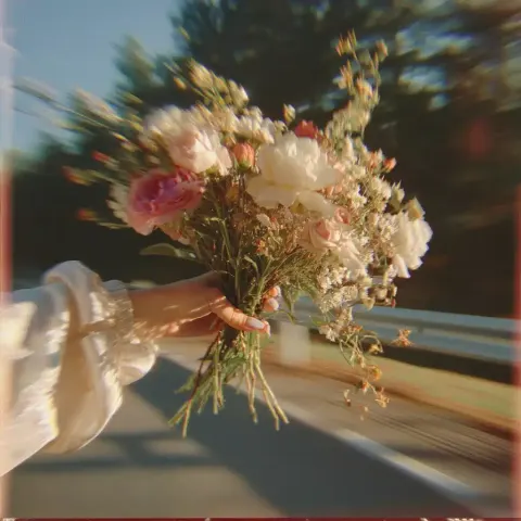 Blurry Hand with Bouquet