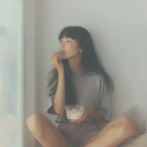 Photo-Realistic Japanese Girl Eating Yogurt
