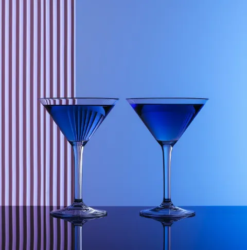 Striped Minimalist Cocktail Glasses With Blue Liquid