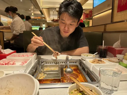 Couple Dining at Haidilao Restaurant