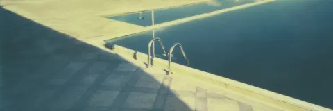 Serene Poolside Golden Hour Shadows